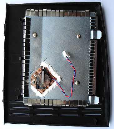 battery holder attached to inside of removable cover